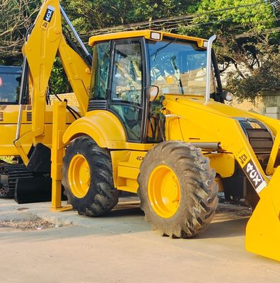 74.6kW JCB 4CX Gebruikte laadmachine Geel 4378kg Lift tweedehands baggerloader Wiel in beweging