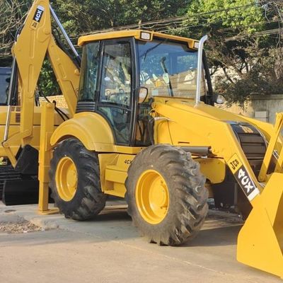 74.6kW JCB 4CX Gebruikte laadmachine Geel 4378kg Lift tweedehands baggerloader Wiel in beweging
